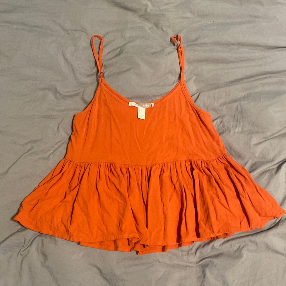 Baby doll ruffle bottom top.